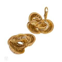 Gold stylized knot form earclips