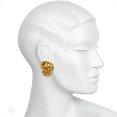 Gold stylized knot form earclips