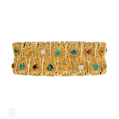 Gold stylized leaf and gemset bracelet