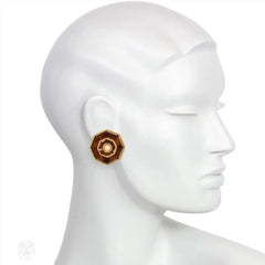 Gold, tortoise shell, and coral earrings, Boucheron.