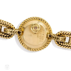 Gold wristwatch with tiger's eye face, L'Enfant for Hermès