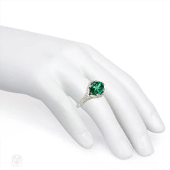 Green zircon solitaire ring with Edwardian style platinum band