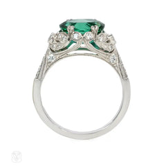 Green zircon solitaire ring with Edwardian style platinum band