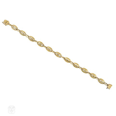 Jean Paris Gemini and Sagittarius gold zodiac bracelet