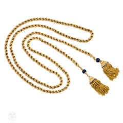 Long gold lariat with gemset tassels