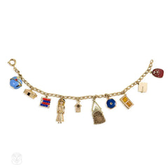 Mid-Century gold bracelet with gold and enamel charms