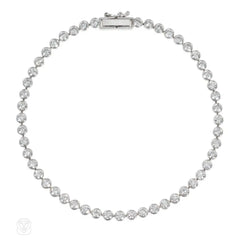 Modern platinum and diamond line bracelet
