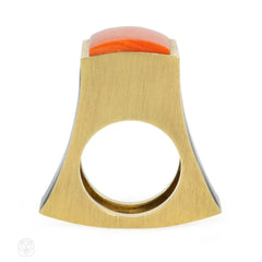 Modernist coral, onyx, and gold ring