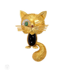 Onyx and gold Chat Malicieux brooch