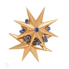 Pair of Retro gold star brooches, Cartier