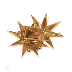 Pair of Retro gold star brooches, Cartier