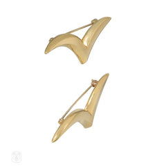 Pair of Tiffany gold stylized bird brooches