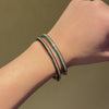 Pair of green and black ceramic bangles