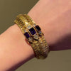 Antique gold strap bracelet with diamond and amethyst ornament