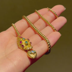 Antique gold and gemset snake necklace