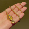 Antique gold and gemset snake necklace