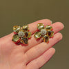 Cartier, Paris Retro gold and diamond flower earrings
