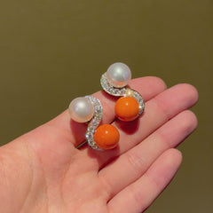 Mid-century toi et moi pearl, coral, and diamond earrings