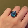 Art Deco black opal, emerald, and sapphire ring