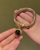 Antique snake chain bracelet with garnet heart charm