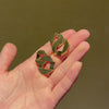 Pair of gold flat link earrings