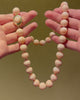 Angel skin coral bead and gold necklace