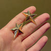 Angela Cummings beveled star earrings