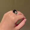 Marchak, Paris Art Deco sugarloaf onyx, coral, and emerald cocktail ring