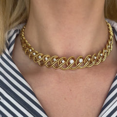 Cartier Mid-Century gold and diamond scrolling necklace