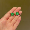 Cartier Art Deco jade, amethyst, diamond, and enamel flower earrings