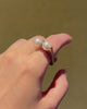 Cartier platinum, pearl and diamond spinner ring