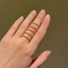 Flexible gold bead and diamond spring ring
