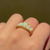 Antique graduated opal half-hoop ring