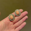 Retro angel skin coral and diamond oval cluster earrings
