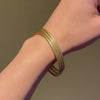 Set of three French yellow gold bangles