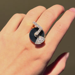 Onyx, gold and diamond spinner ring