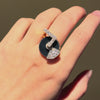 Onyx, gold and diamond spinner ring