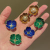 Boucheron, Paris interchangeable pearl, enamel and diamond flower earrings