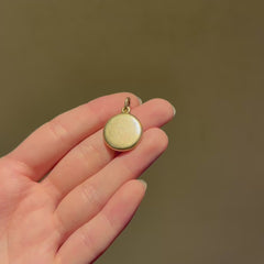 Antique gold circular locket charm
