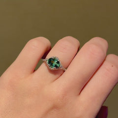 Green zircon solitaire ring with Edwardian style platinum band