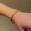 Square gold curb link bracelet