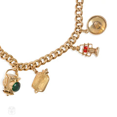 Retro gold eight-charm curblink bracelet