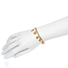 Retro gold eight-charm curblink bracelet