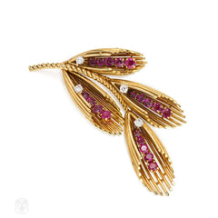Retro gold, ruby, and diamond foliate motif brooch