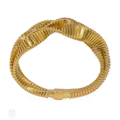 Retro three-row gold gaspipe bracelet, France