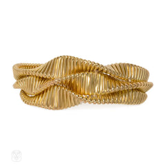 Retro three-row gold gaspipe bracelet, France