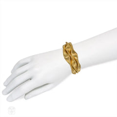 Retro three-row gold gaspipe bracelet, France