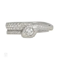 Textured platinum and diamond snake ring