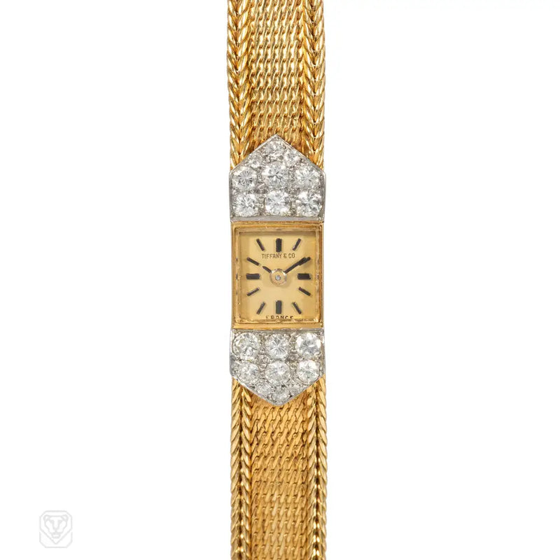 Tiffany & Co. France diamond and gold dress watch with case by Uti