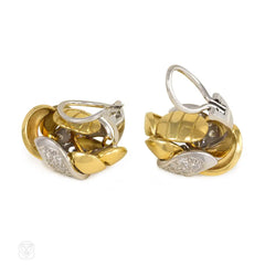 Two-color gold and diamond knot design earrings, Emil Meister